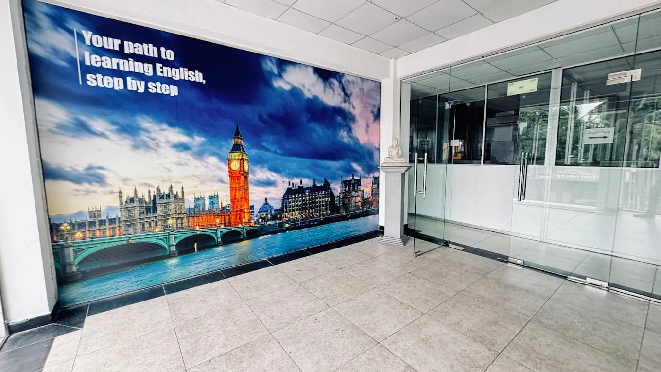ESOL College entrance with English learning mural