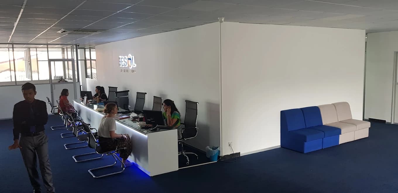 ESOL College International office with staff and reception desk
